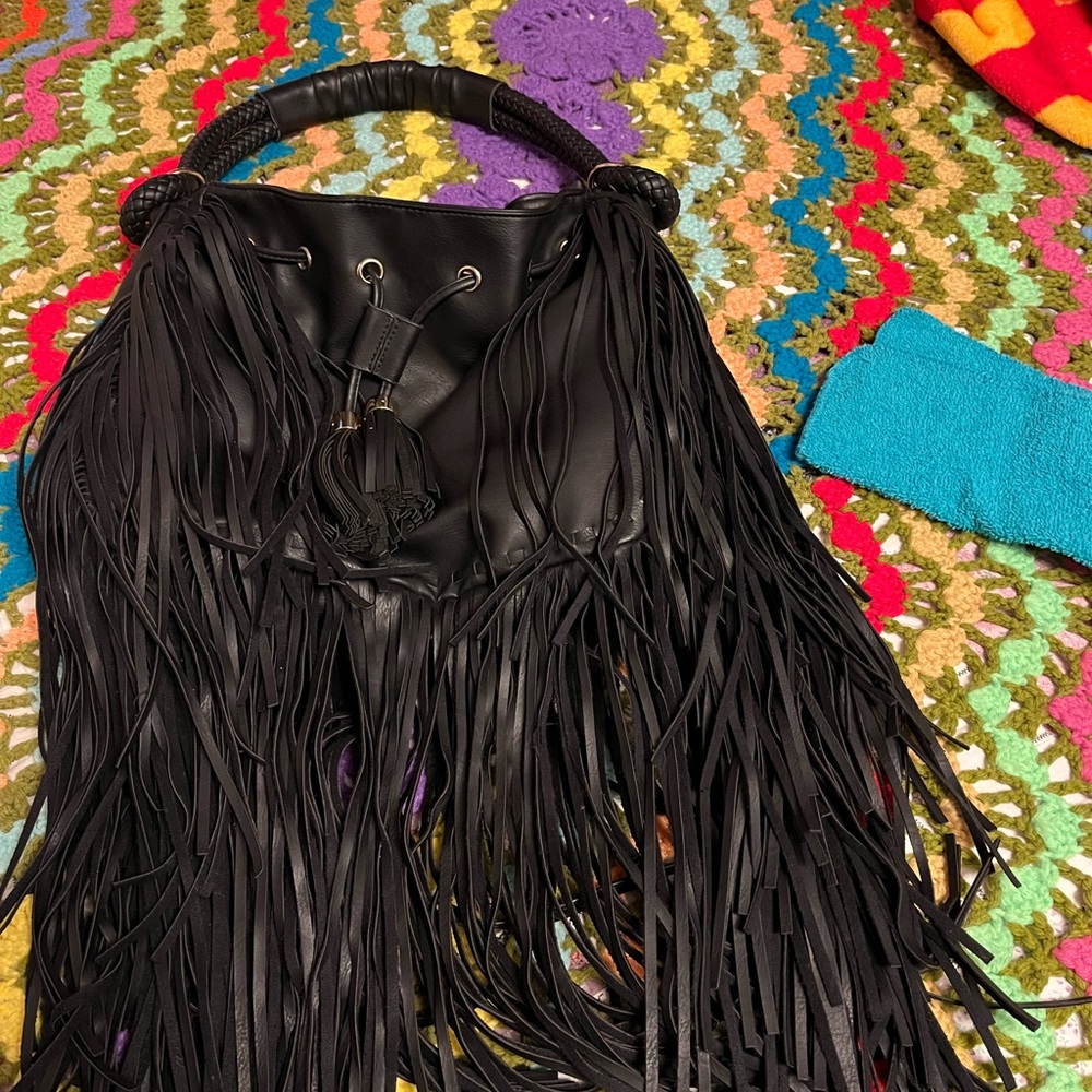 A Yoki fringed purse